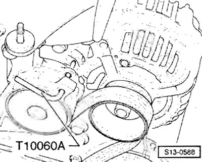 Застопорить натяжной ролик при помощи дорна…