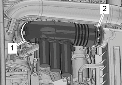 3. Release the air hoses from the clamps on the…