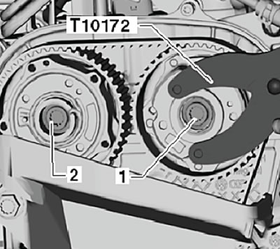 Caution: If the timing belt is to be reused, an…