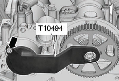 9. Unscrew the mounting bolt (arrow) and remove…