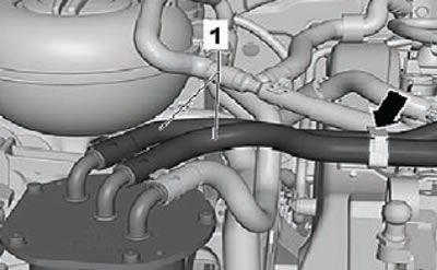 5. Open the holder (arrow) and pull out the fuel…