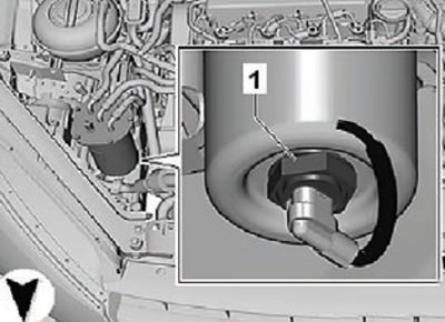 7. Move the fuel filter assembly to the side.