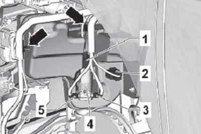 8. Remove the fasteners (arrows) securing the…