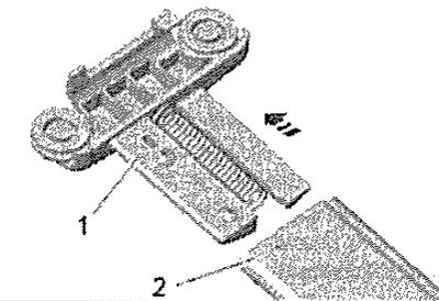 Отстранете левия и десния плъзгащи се водачи «1»…