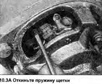 3. Чтобы снять щетку для осмотра, откиньте…