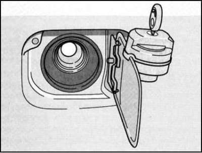 Заливная горловина топливного бака расположена в…