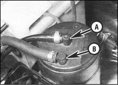 1. Отсоедините от верхней части адсорбера…