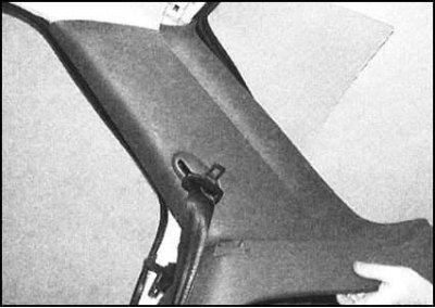 12. Отделите от кузова панель отделки задней…