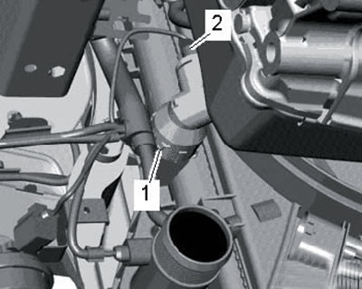 23.19. Датчик (2) температуры ОЖ на выходе…