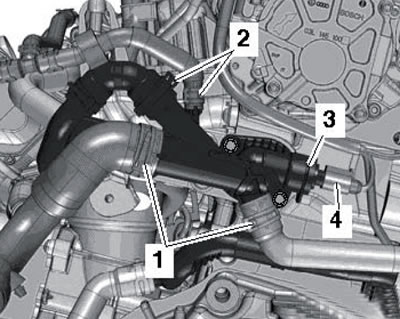 39.11. Разъём (4) датчика ЕСТ и фиксаторы (1 и 2)…